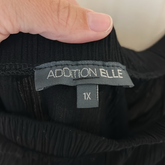 Black strapless dress with ruffles at bottom. Midi length - Picture 2 of 3